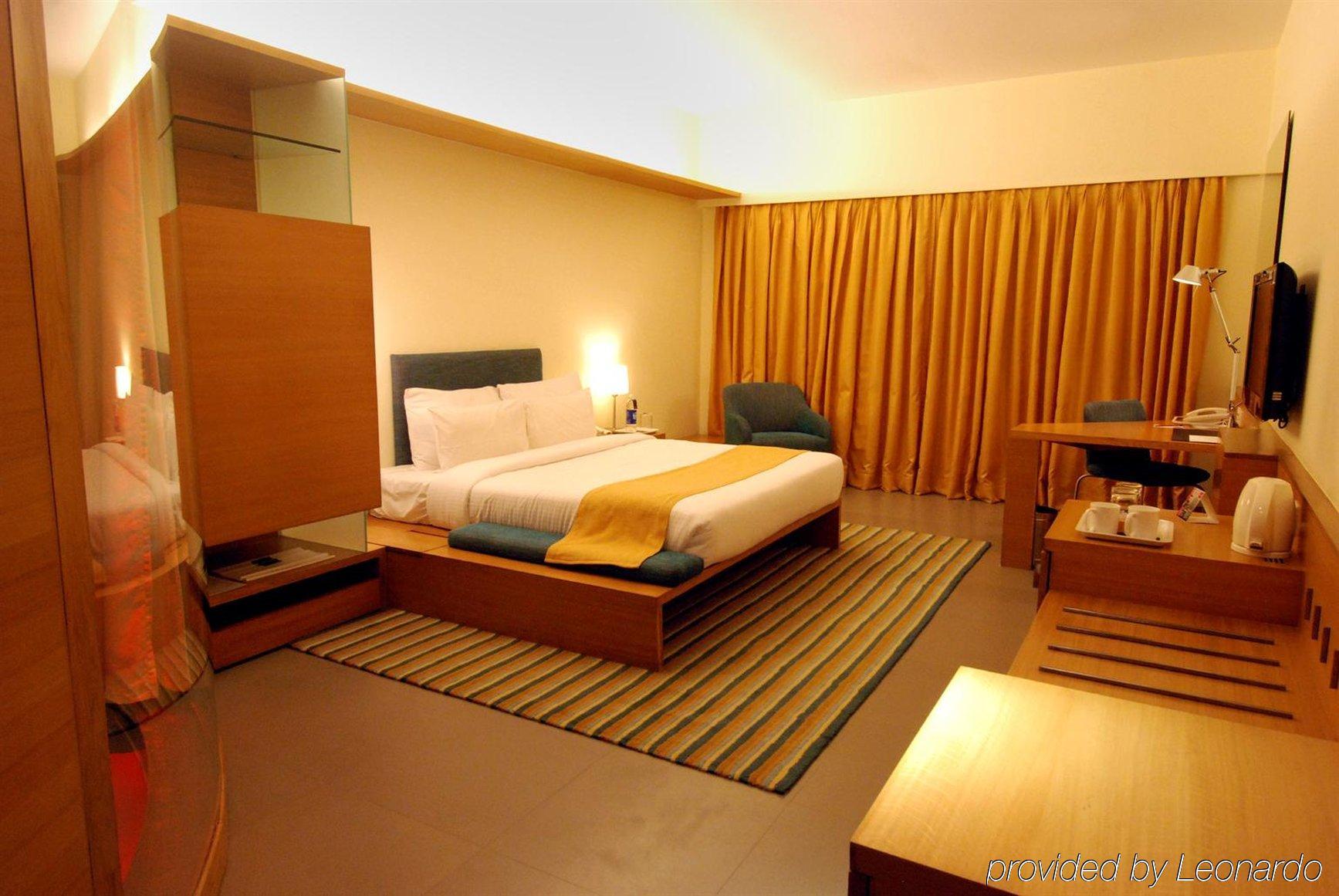Hotel Parc Estique Pune Habitación foto